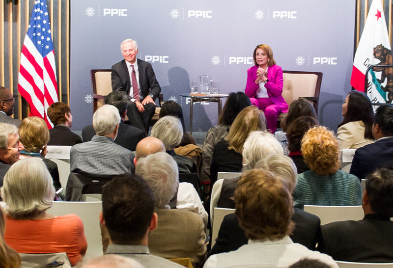 Photo of Mark Baldassare and Nancy Pelosi with audience