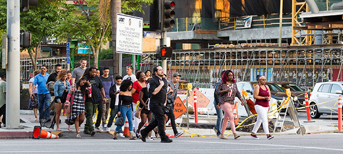 photo - Pedestrians Walking Across the Street in Los Angeles, California