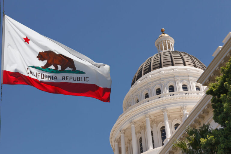 photo - California state capitol dome with flag