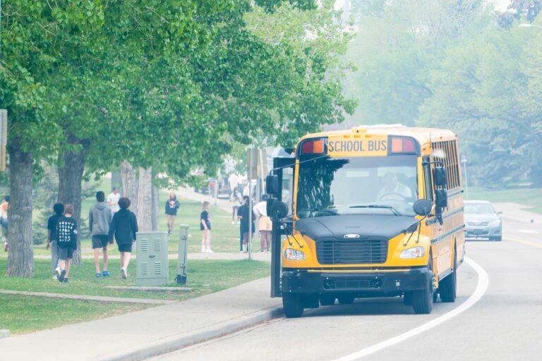 photo - School Bus Picking Up Students during Smoky Day during Wildfires